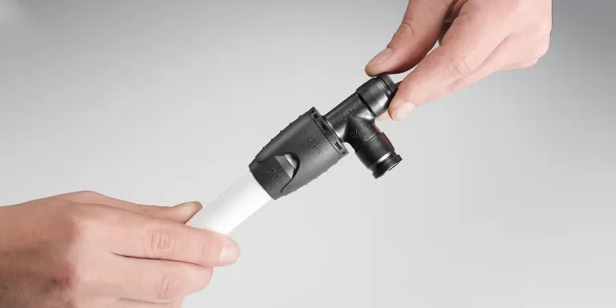 Elbow module being pushed onto the adapter